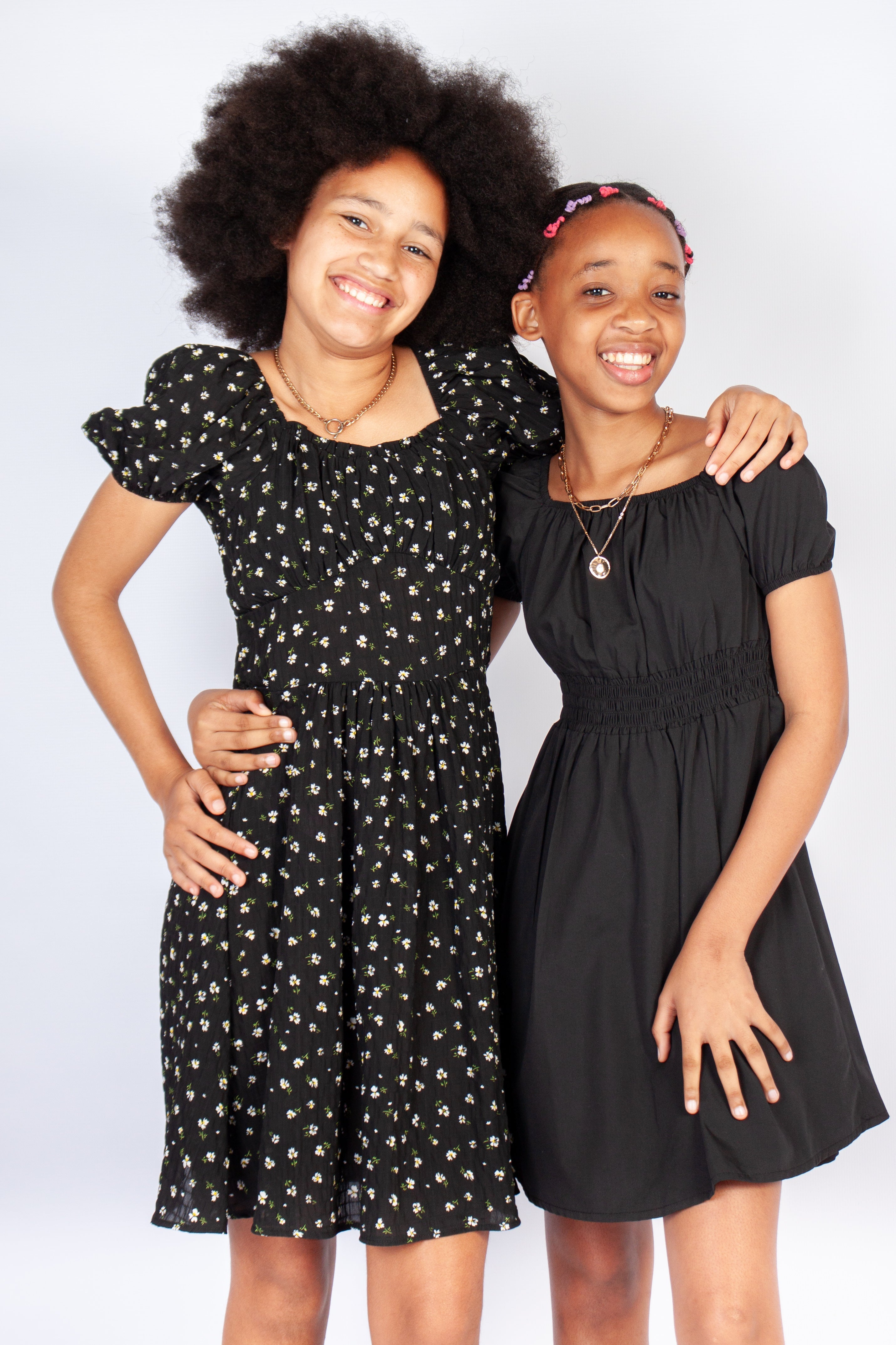 Older Girls Take 2 Dresses for R160